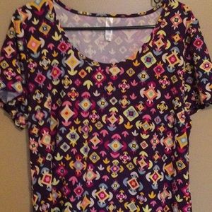 Like new Lularoe Classic T Shirt, size XL. Geometric pattern in purple